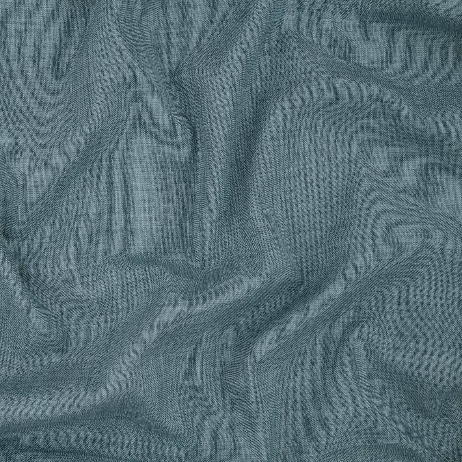 Muted airforce-blue woven cloth with fine crosshatch texture and soft rippled folds