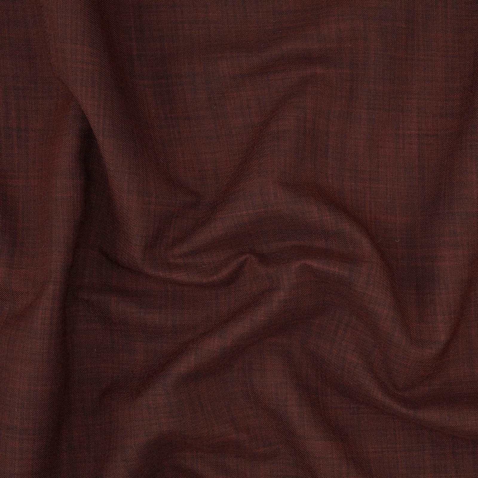 Dark burgundy woven cloth with fine crosshatch texture gathered into soft folds