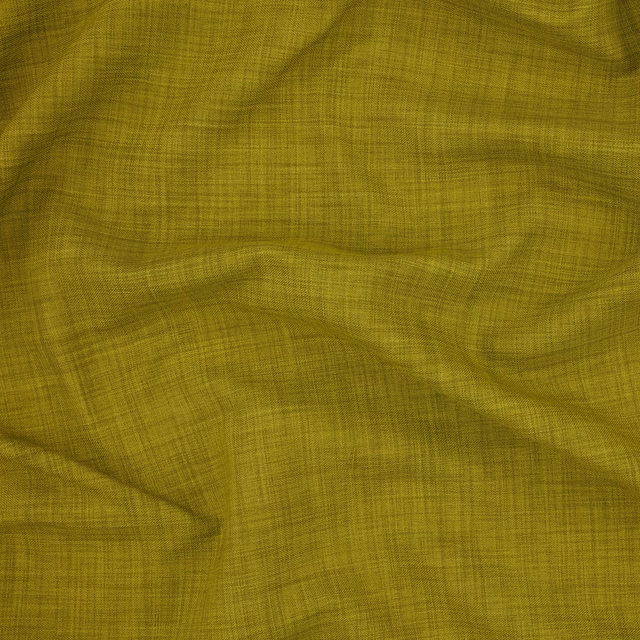 Olive chartreuse woven fabric with fine crosshatch texture in soft rippled folds