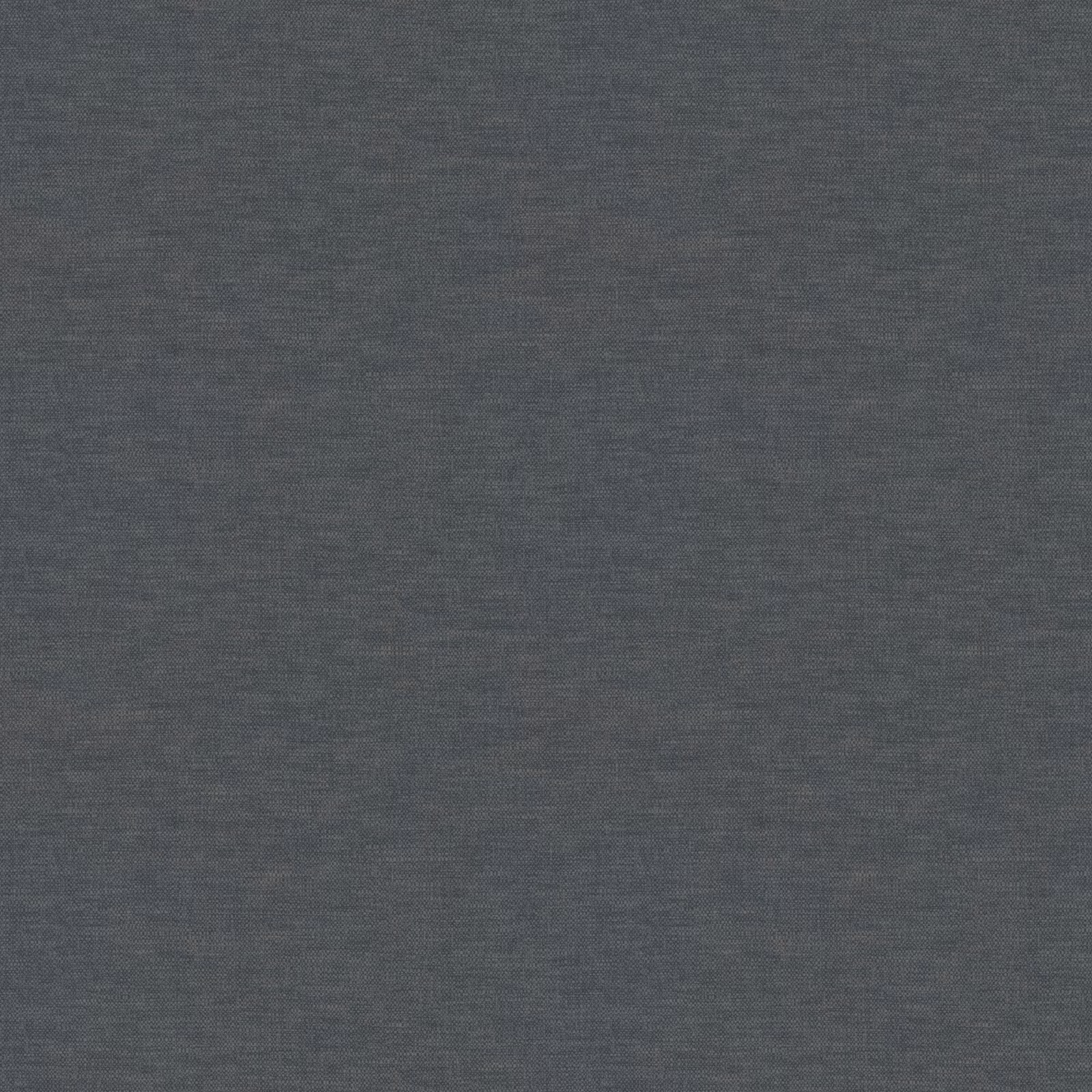 Close-up of deep charcoal grey fabric with a fine, subtly variegated woven texture