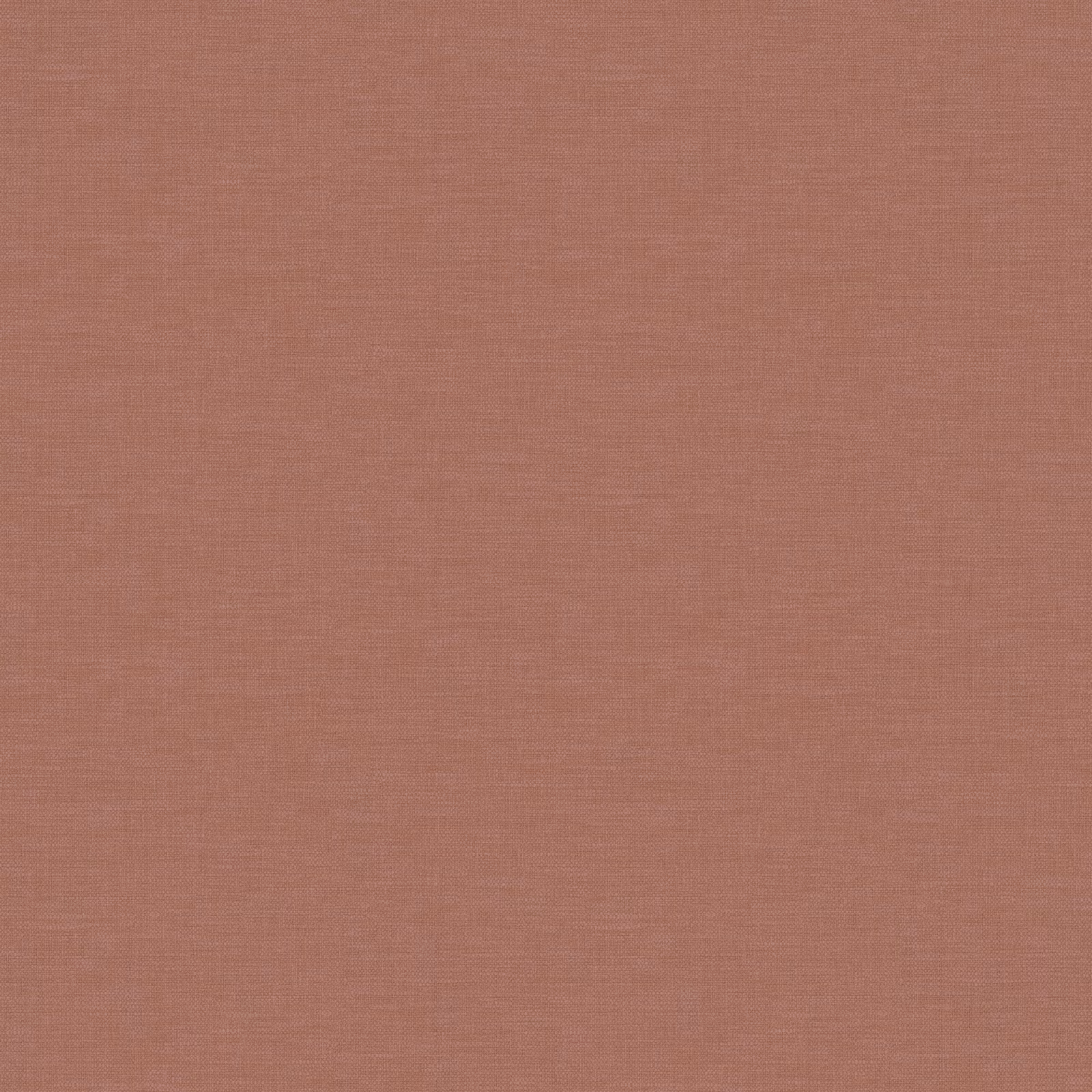 Close-up of dusty rose pink fabric with a fine, subtle woven texture