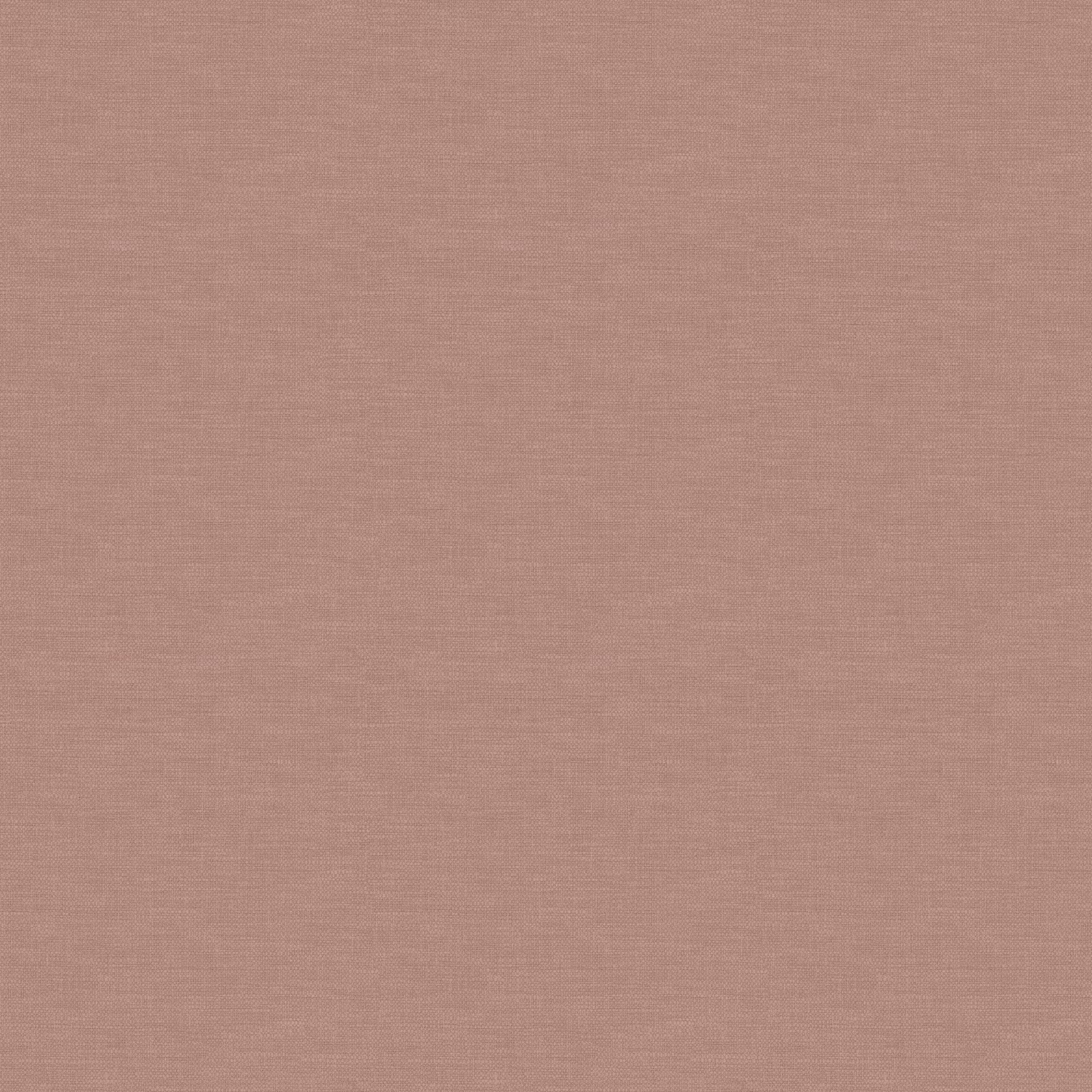 Close-up of muted dusty rose fabric showing a subtle, fine woven texture