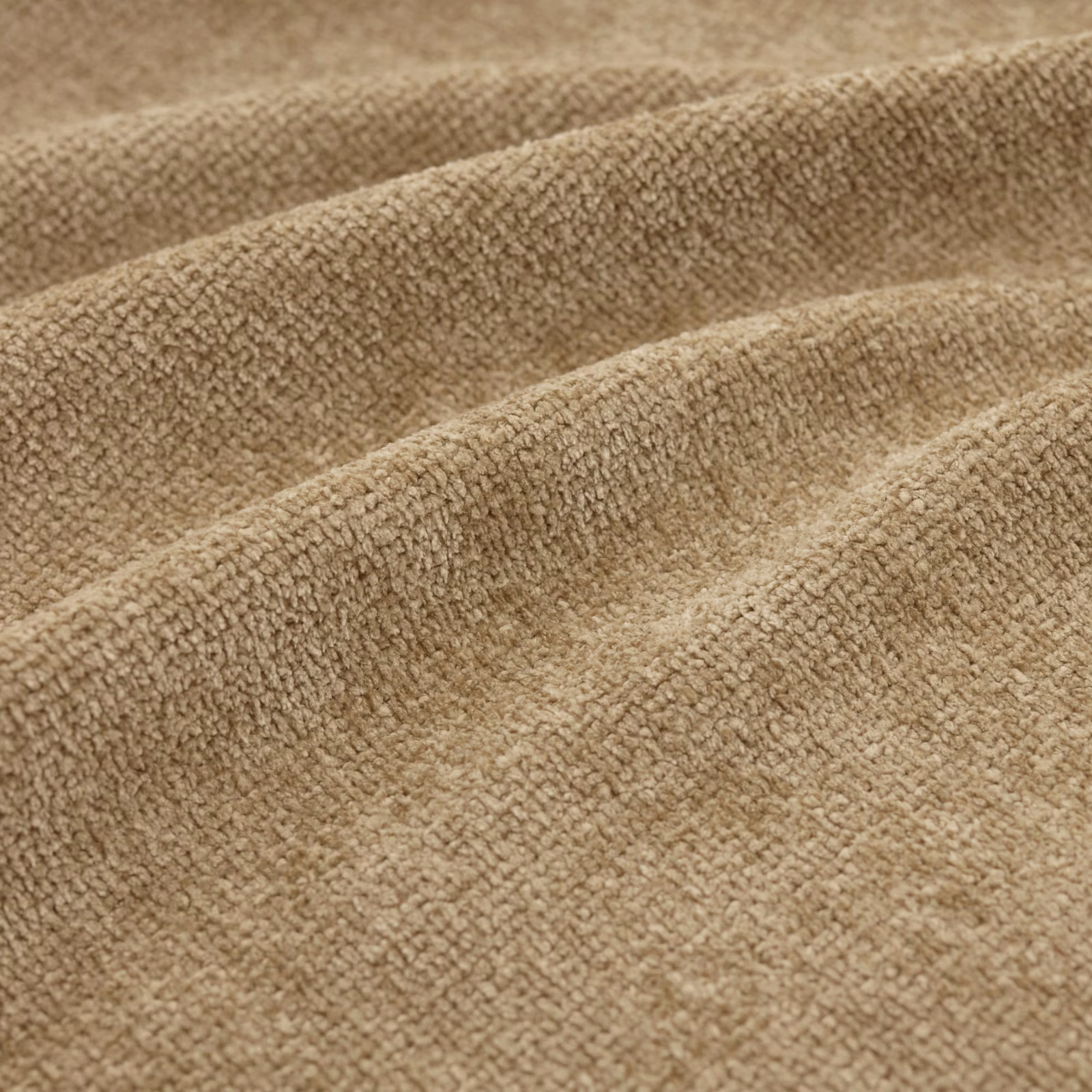 Close-up of Suave Dune’s warm dune-toned, raised nubby woven texture