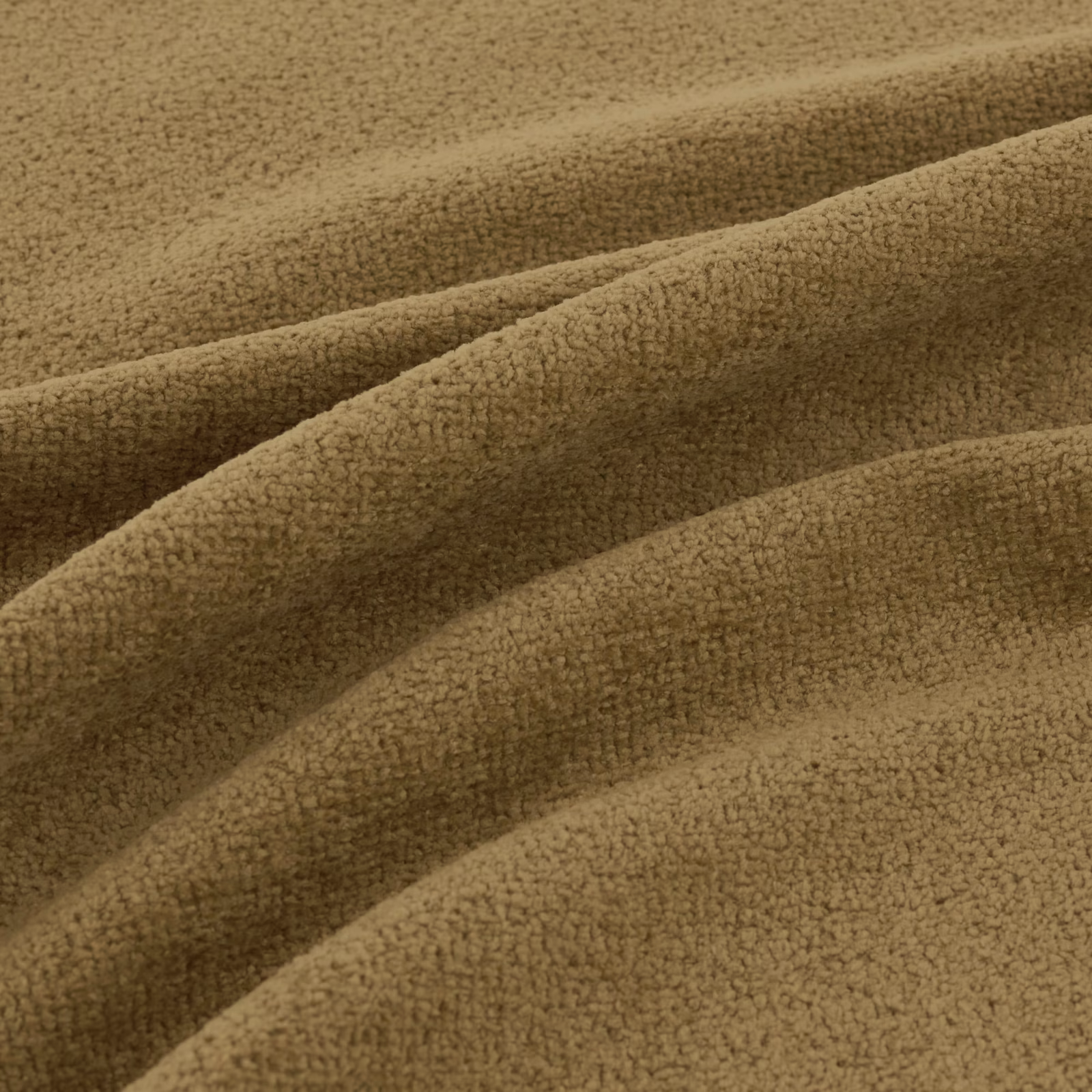 Close-up of warm fennel-olive plush fabric with fine looped texture and folded ridges