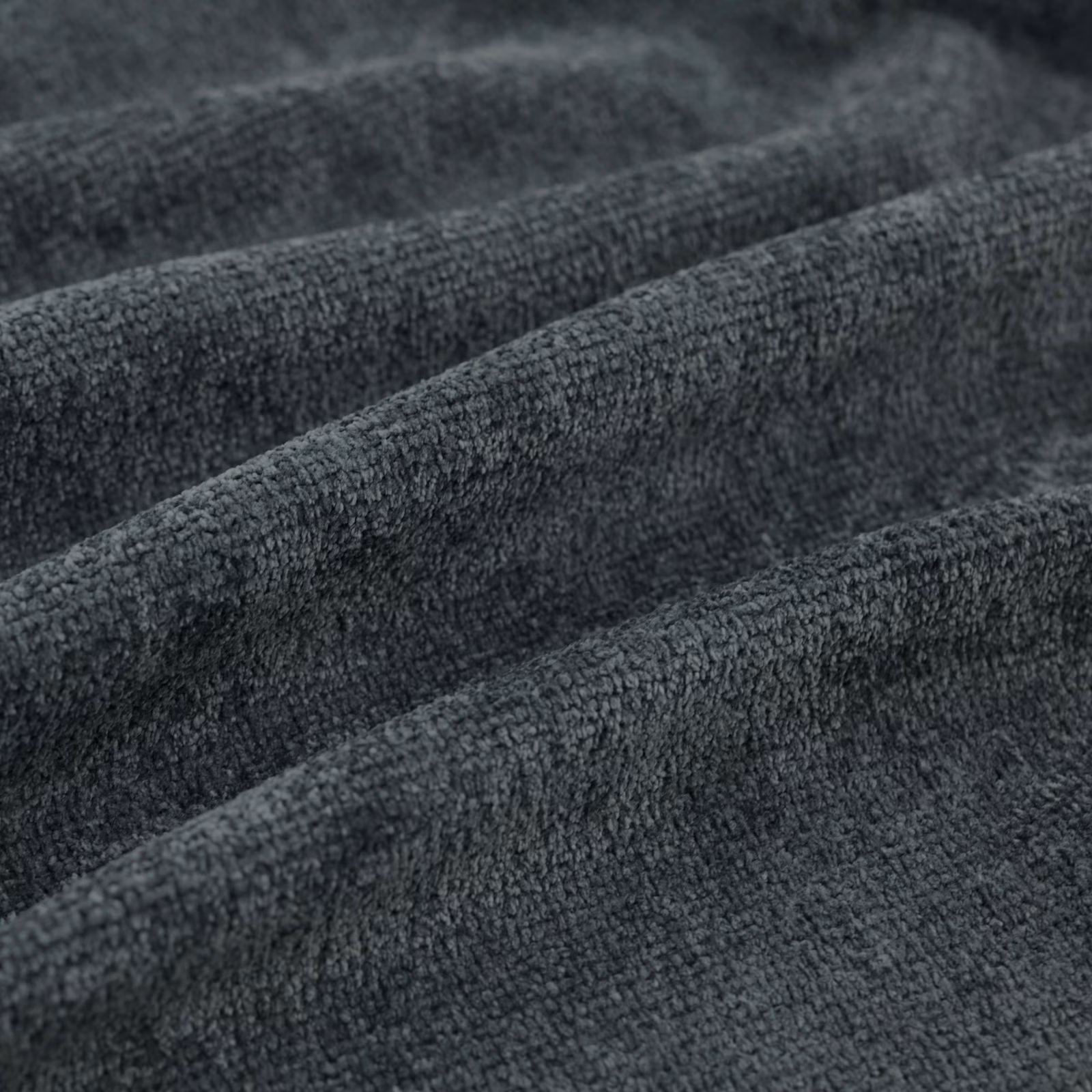 Deep charcoal-grey Suave fabric with nubby woven texture in soft folds