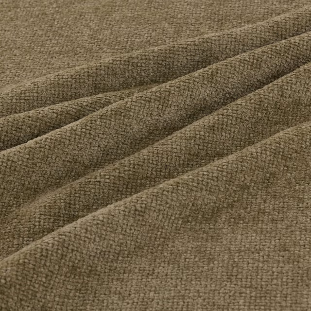 Close-up of muted olive-brown fabric with a dense nubby woven texture in soft folds