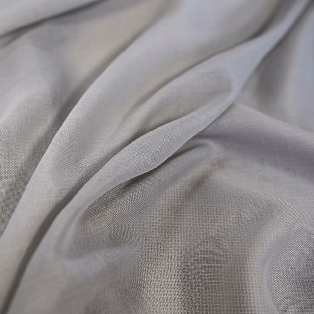 Cool silver-grey woven fabric draped in soft folds with a fine textile texture