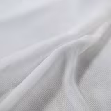 Cool white fabric with a fine open weave draped into soft flowing folds