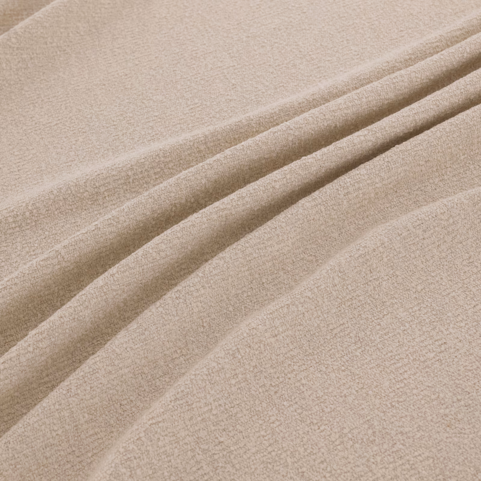 Pale chalk-beige finely textured fabric arranged in soft diagonal folds