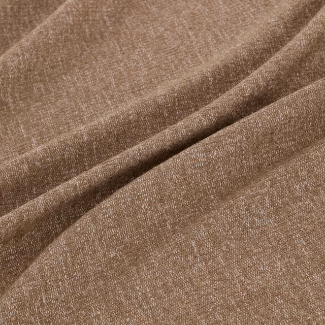 Warm taupe woven fabric with fine pebbled texture arranged in soft folds