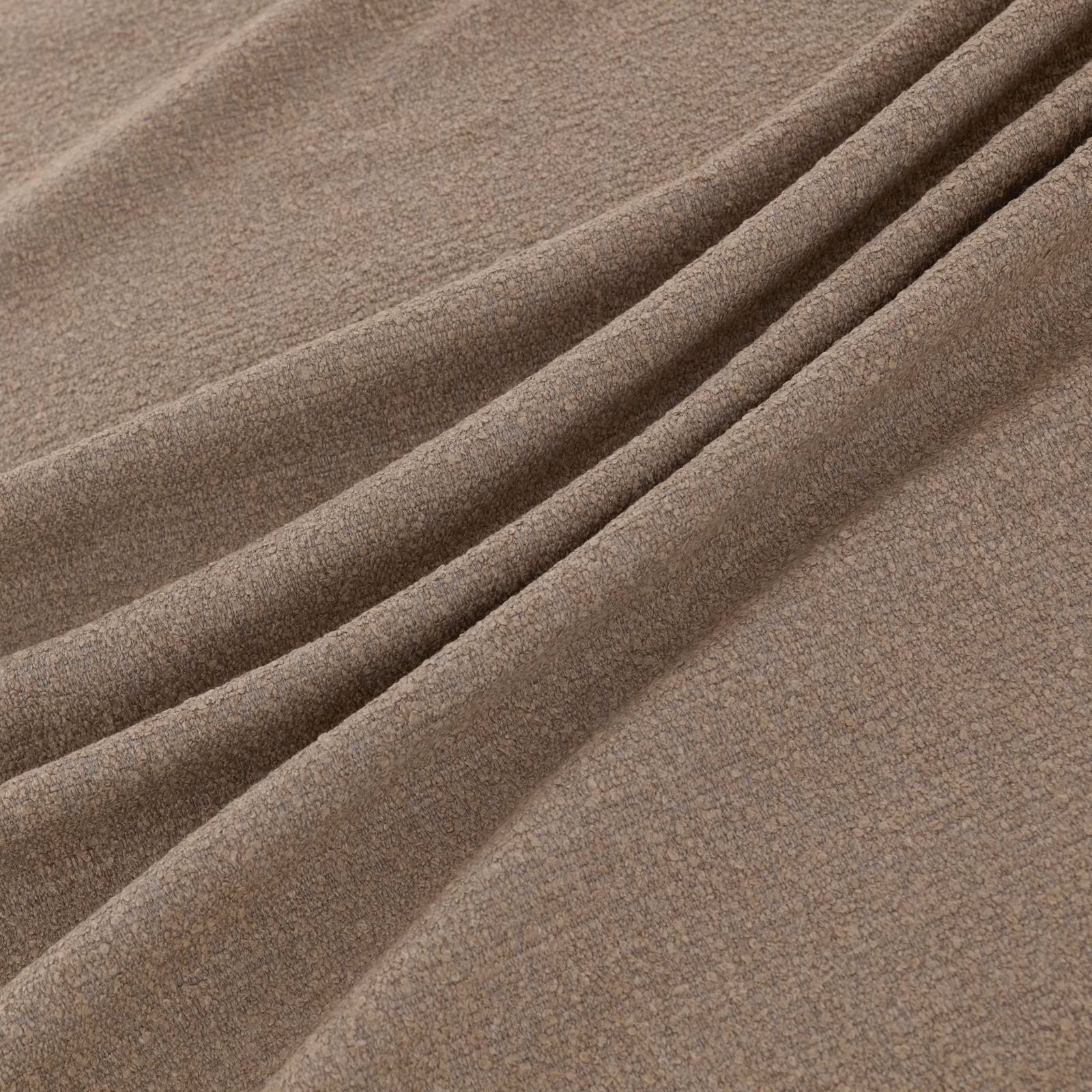 Warm mushroom-taupe fabric with a softly brushed velvety texture draped in broad folds