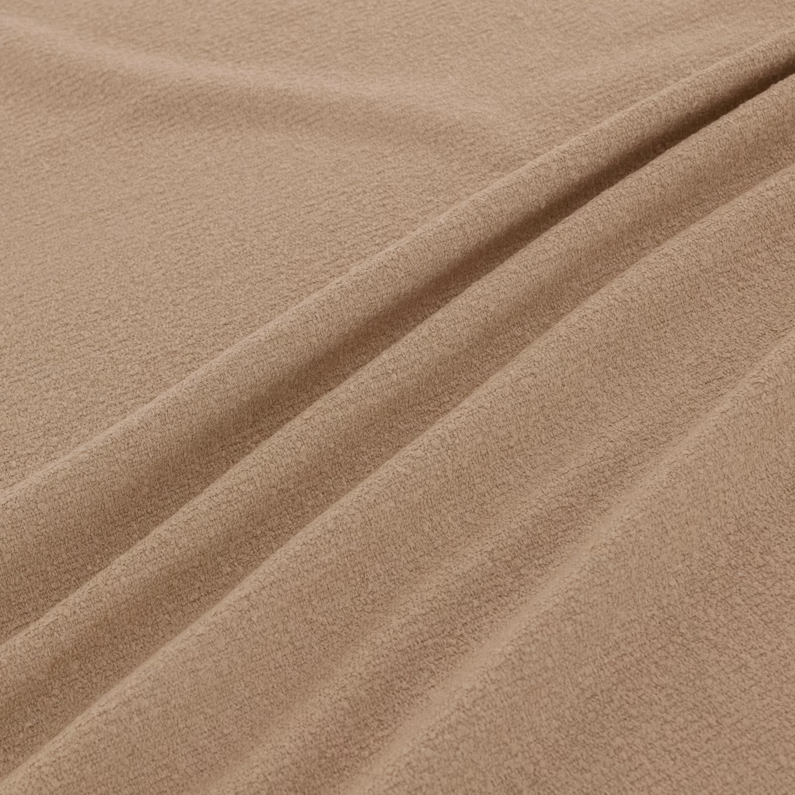 Warm oat-beige plain fabric with softly brushed texture arranged in broad folds