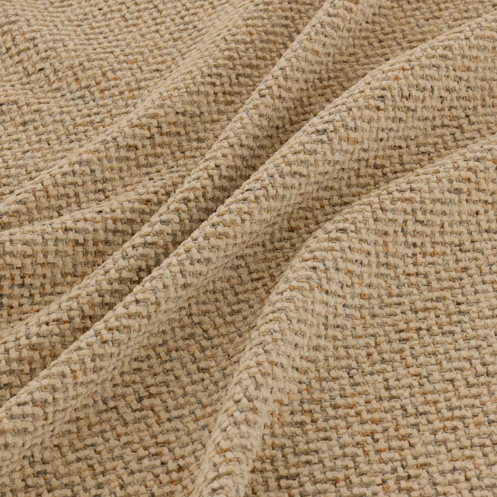 Close-up of warm wheat beige woven fabric with cream, tan and brown flecks