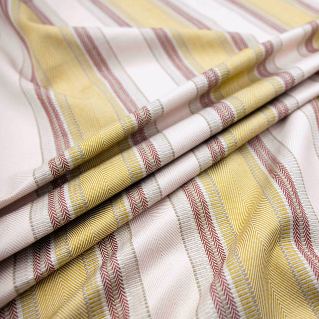 Saffron, blush and ivory striped weave with red and grey chevron details