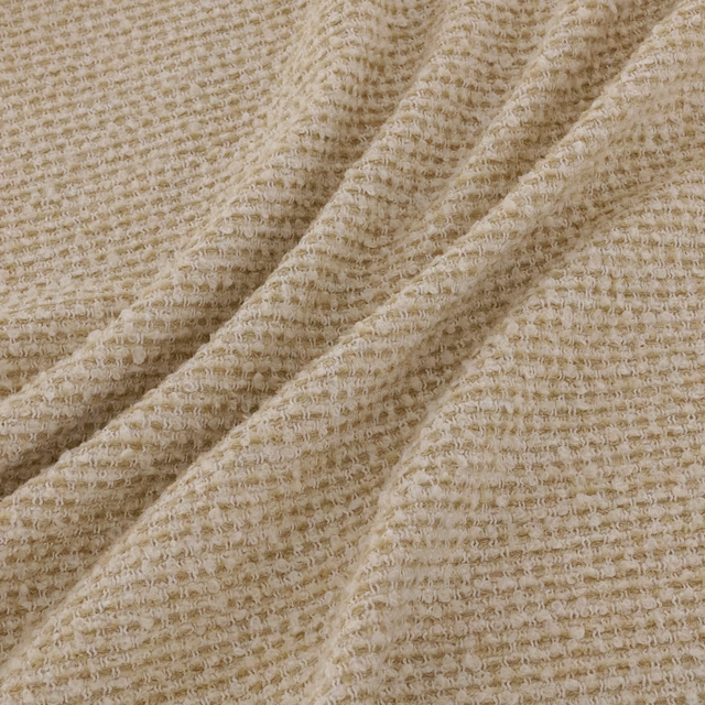 Warm oatmeal-beige looped weave with creamy highlights and soft taupe shadows