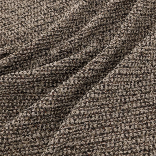 Chunky mottled taupe, brown and charcoal woven fabric with raised nubby texture
