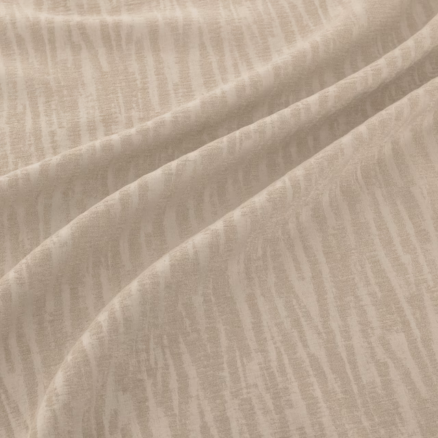 Warm ecru textile with soft vertical striations and a lightly textured surface
