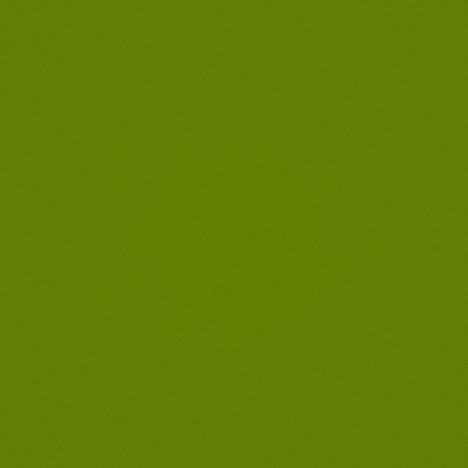 Close-up of vivid grass-green plain weave with a softly mottled surface