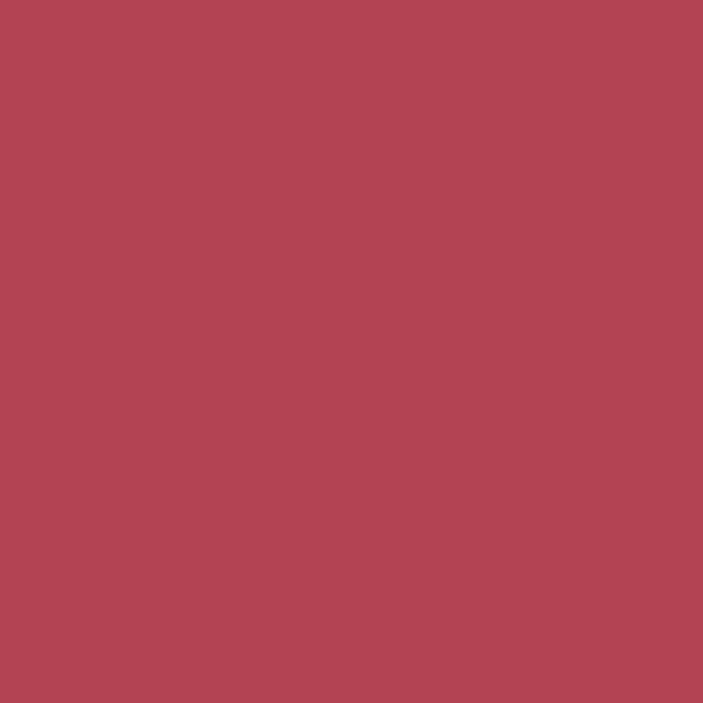 Saturated raspberry-red plain fabric with a subtly textured, matte surface
