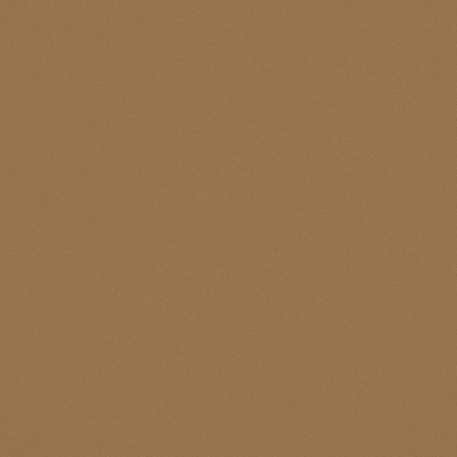 Close-up of plain warm nutmeg brown fabric with a subtle softly matte texture