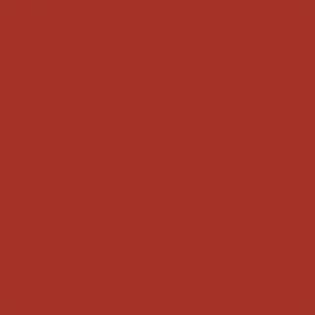 Close-up of solid pillarbox-red textile with a subtle, even surface texture