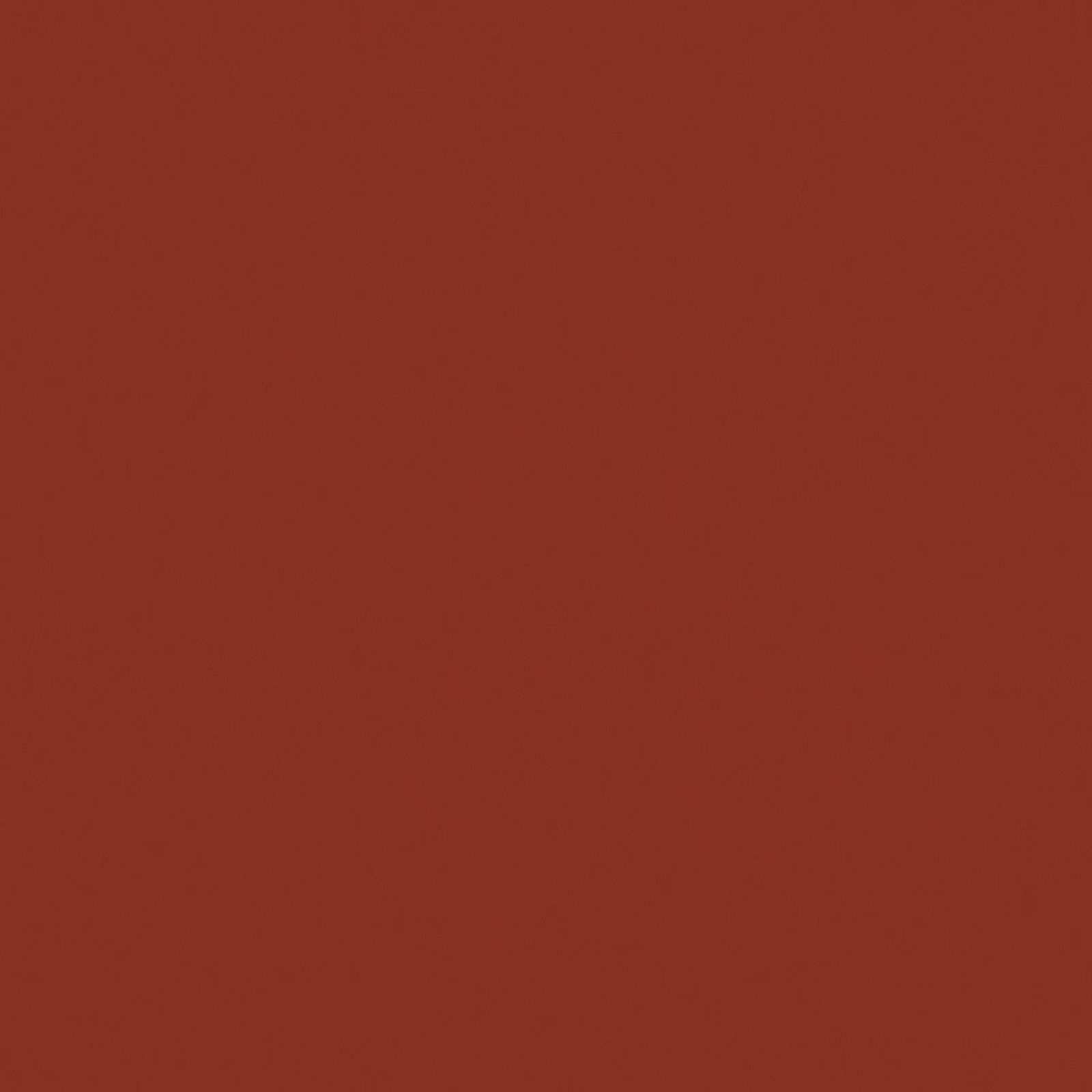 Deep brick-red plain fabric swatch with a subtly even, fine-grained surface