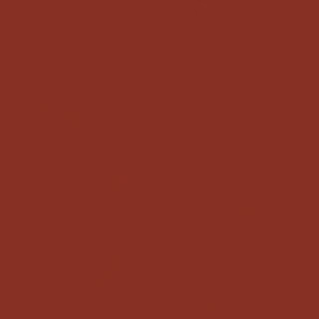 Deep brick-red plain fabric swatch with a subtly even, fine-grained surface
