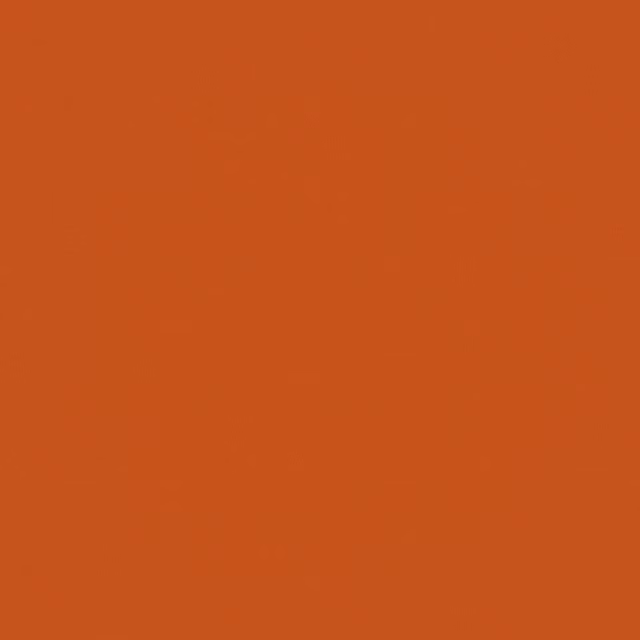 Close-up of solid saturated tangerine-orange fabric with a subtle textured surface