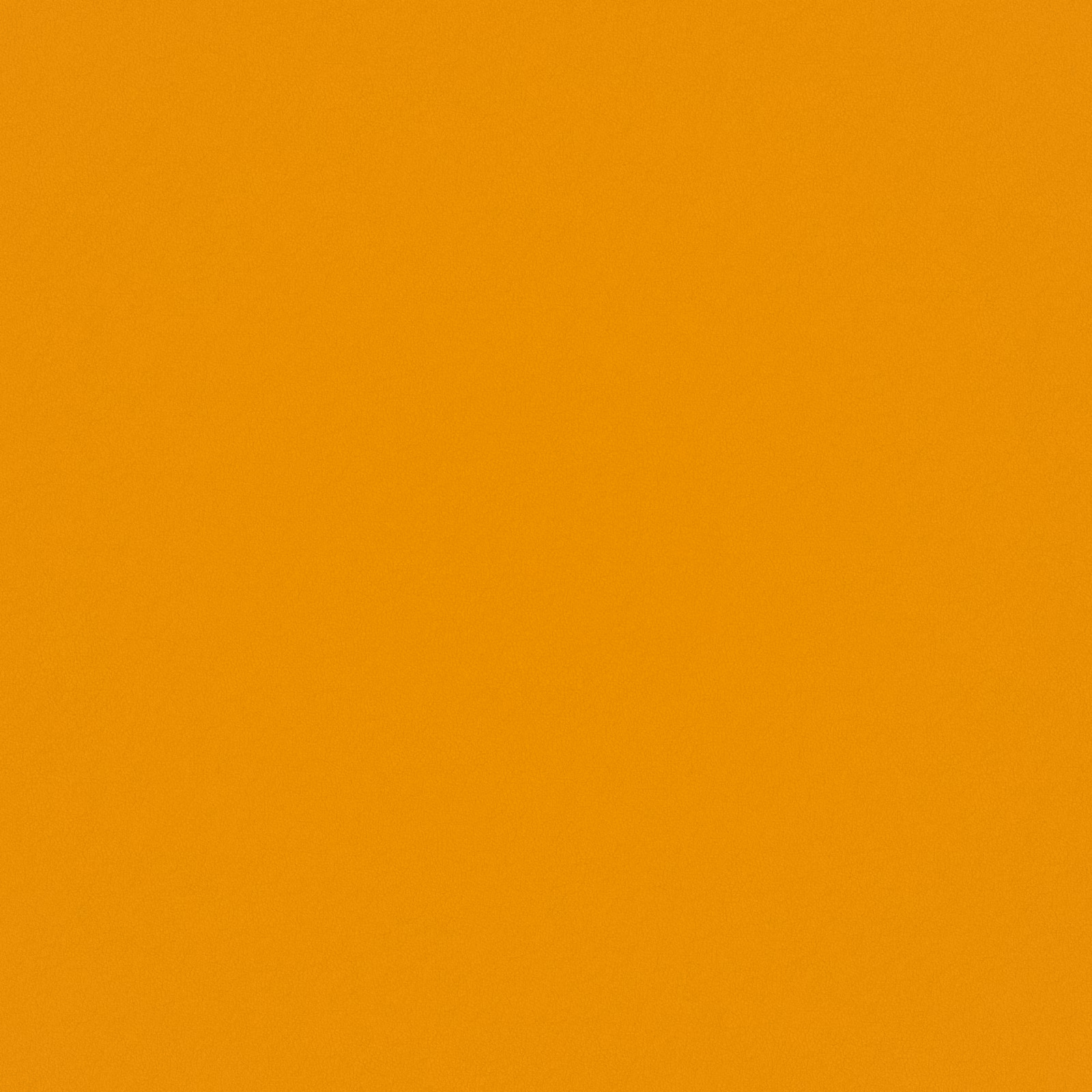 Close-up of Ultra Yolk fabric showing a saturated golden-orange, subtly grained surface