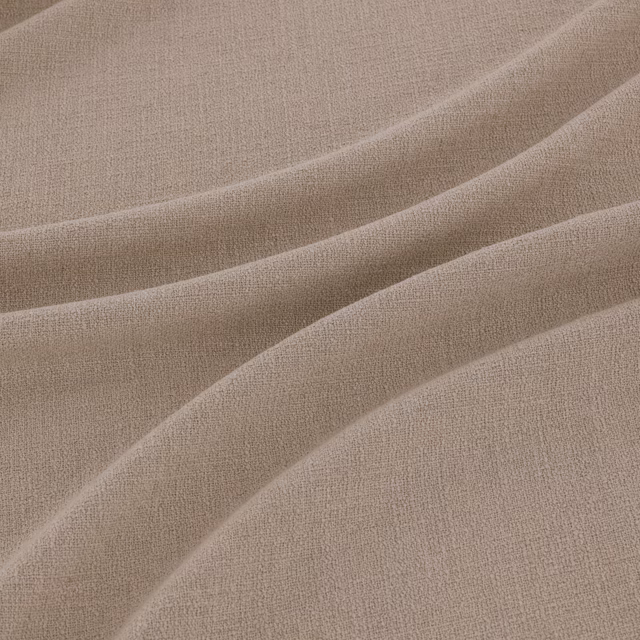 Warm taupe fine weave falling in softly curved, fluid folds