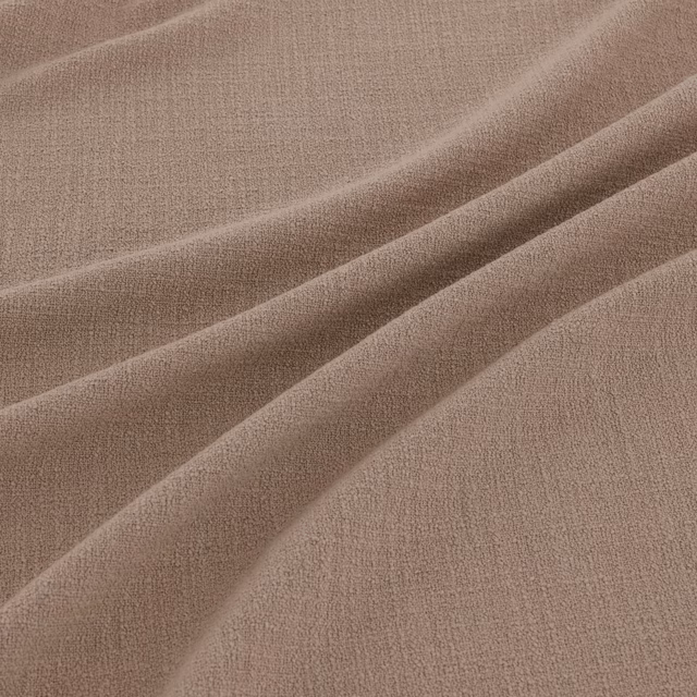 Warm taupe Limestone fabric showing a fine weave in softly layered folds