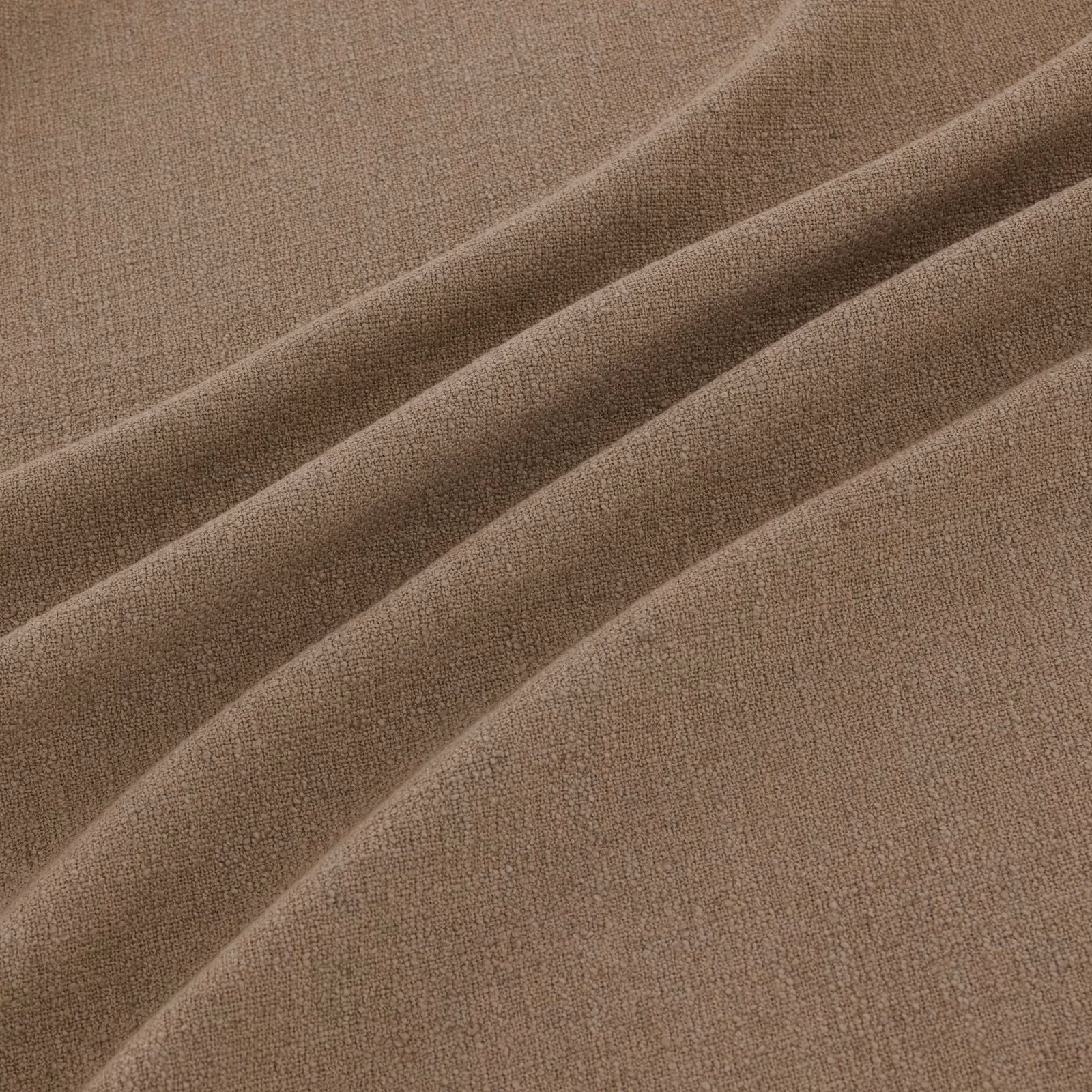 Warm maize-taupe woven fabric with fine grain and broad diagonal folds