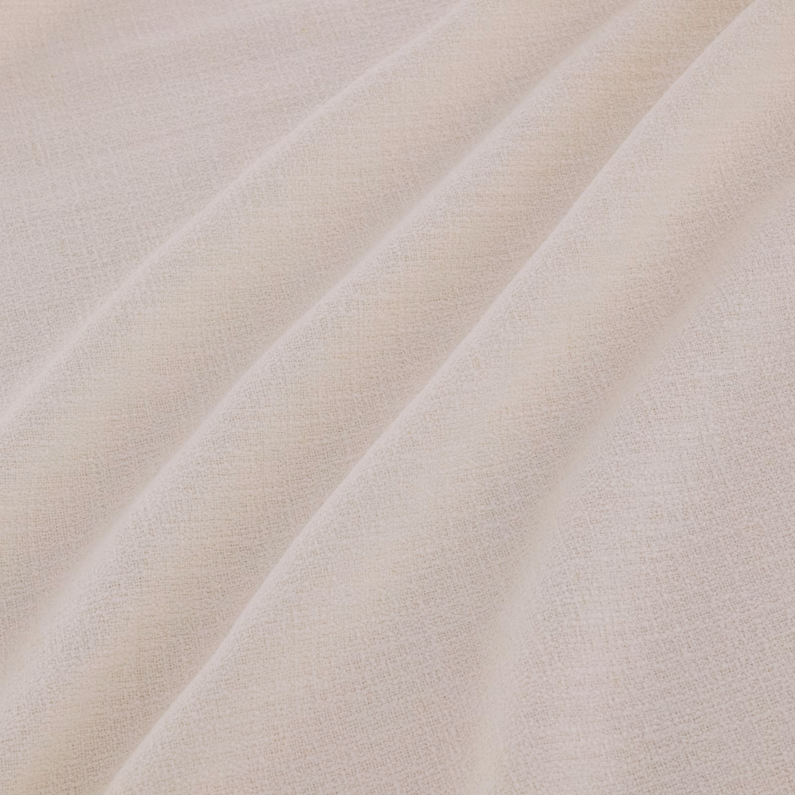 Pale mallow-beige fine weave falling in soft diagonal folds