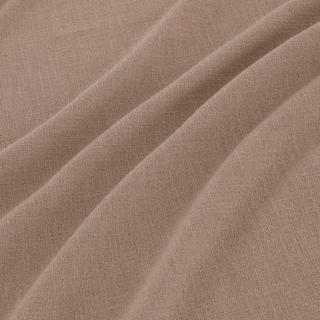 Warm oatmeal taupe woven fabric falling into broad, softly textured diagonal folds
