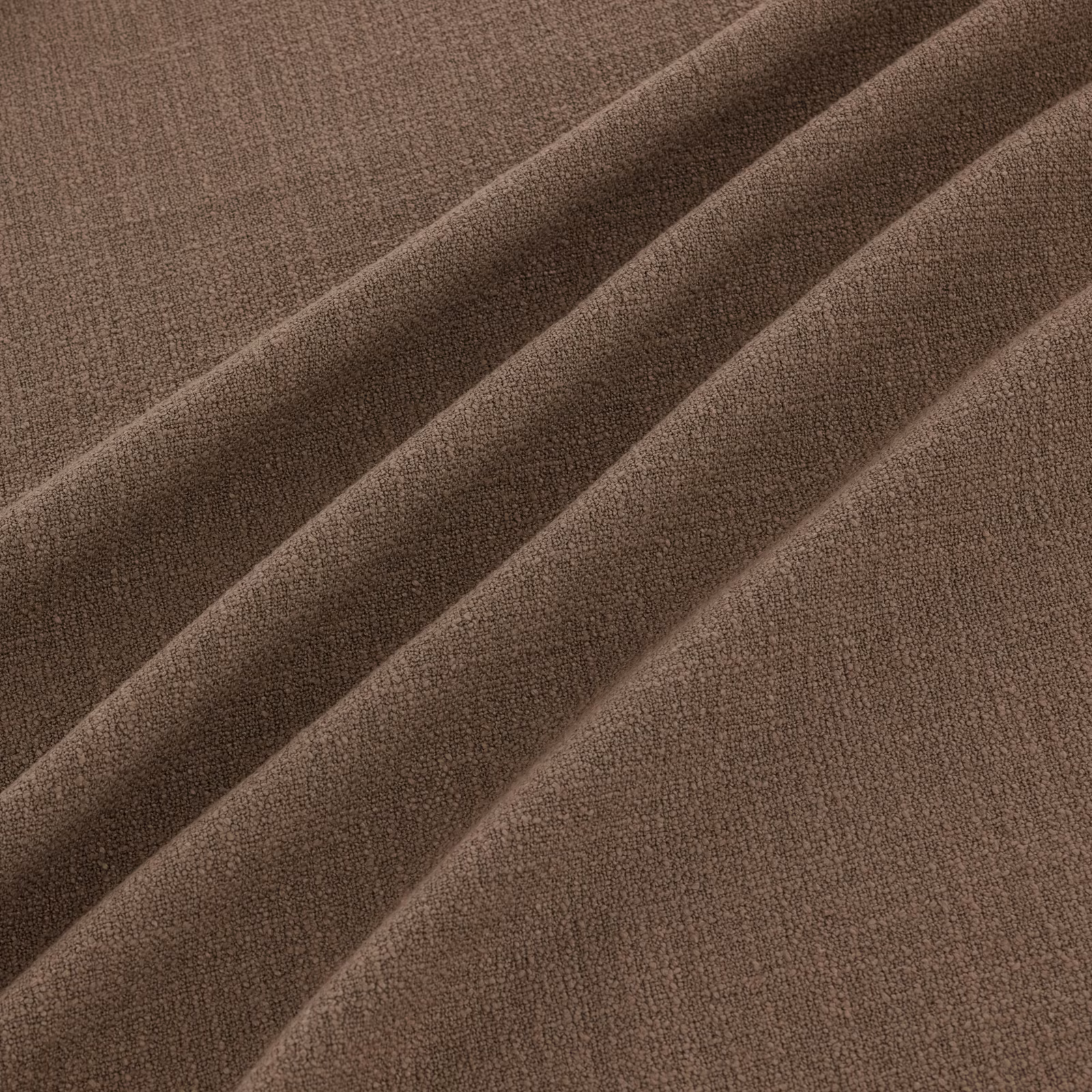 Warm praline-brown woven fabric with fine grain and soft diagonal folds