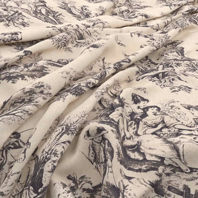 Warm cream toile with charcoal pastoral figures, foliage and softly textured woven ground
