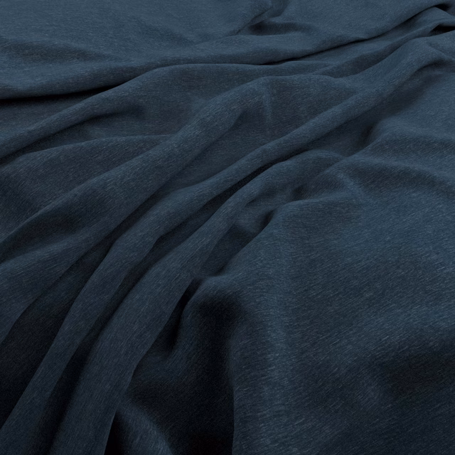 Deep denim-blue velvet fabric draped in softly lustrous, rippling folds