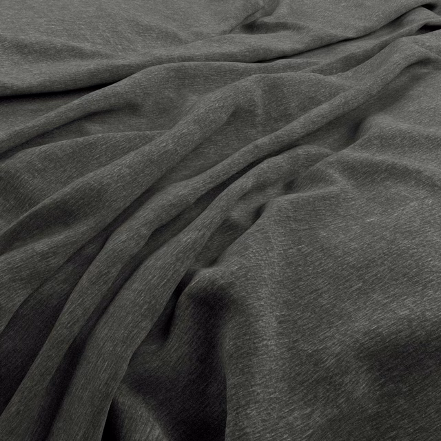 Close view of dark slate-grey velvet with softly shifting nap and folded drape