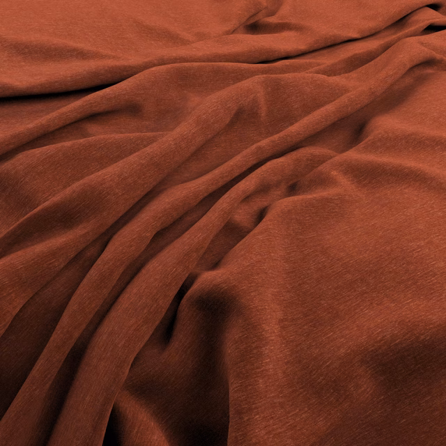 Deep burnt-orange velvet with fine nap and coppery highlights across gathered folds