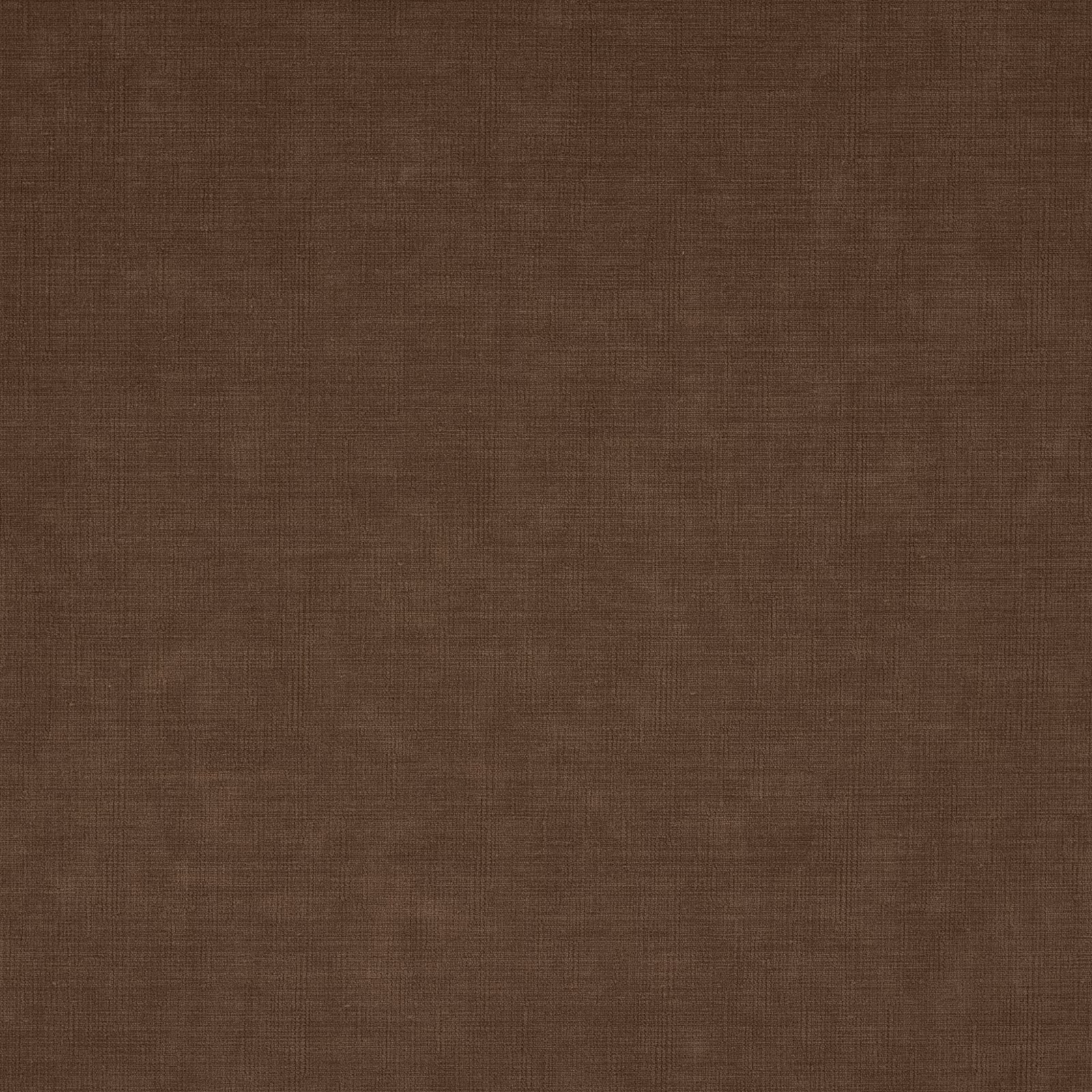 Close view of warm auburn-brown fabric with a subtle fine woven texture