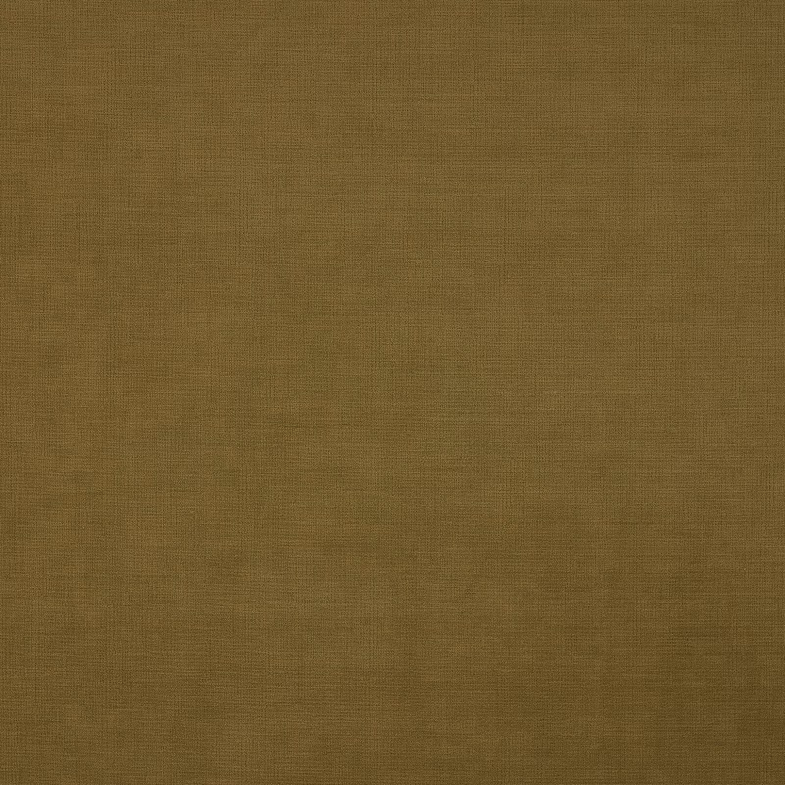 Close-up of muted Dijon mustard-brown fabric with a fine tonal plain weave