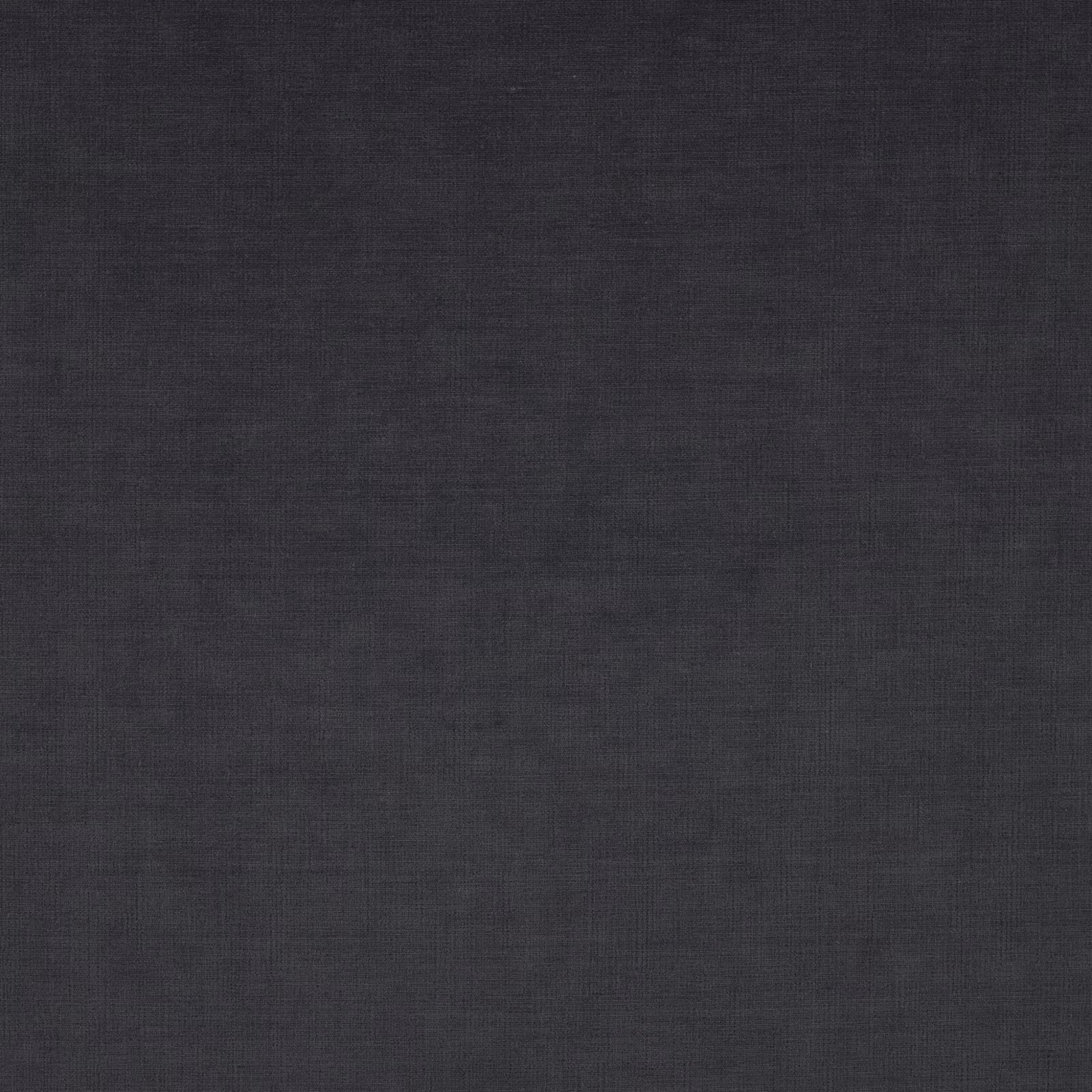 Dark indigo woven textile with subtle crosshatch texture and charcoal depth