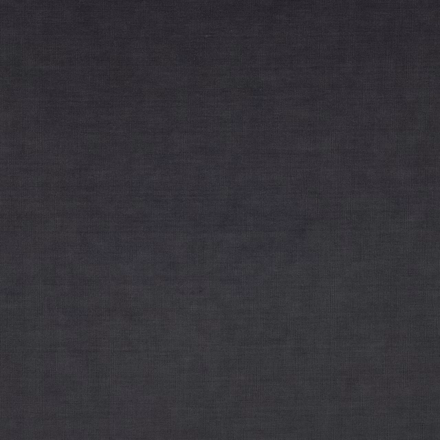 Dark indigo woven textile with subtle crosshatch texture and charcoal depth