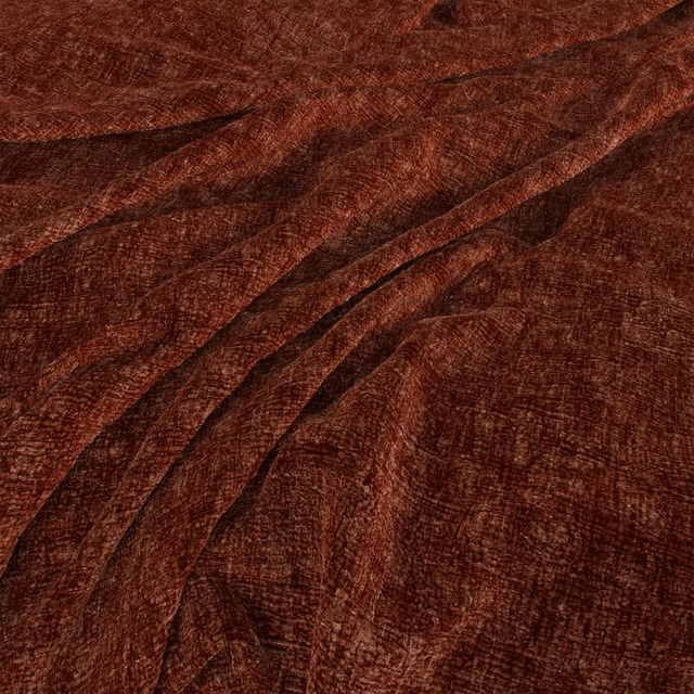 Deep harissa-red fabric with tactile texture and shifting highlights across draped folds