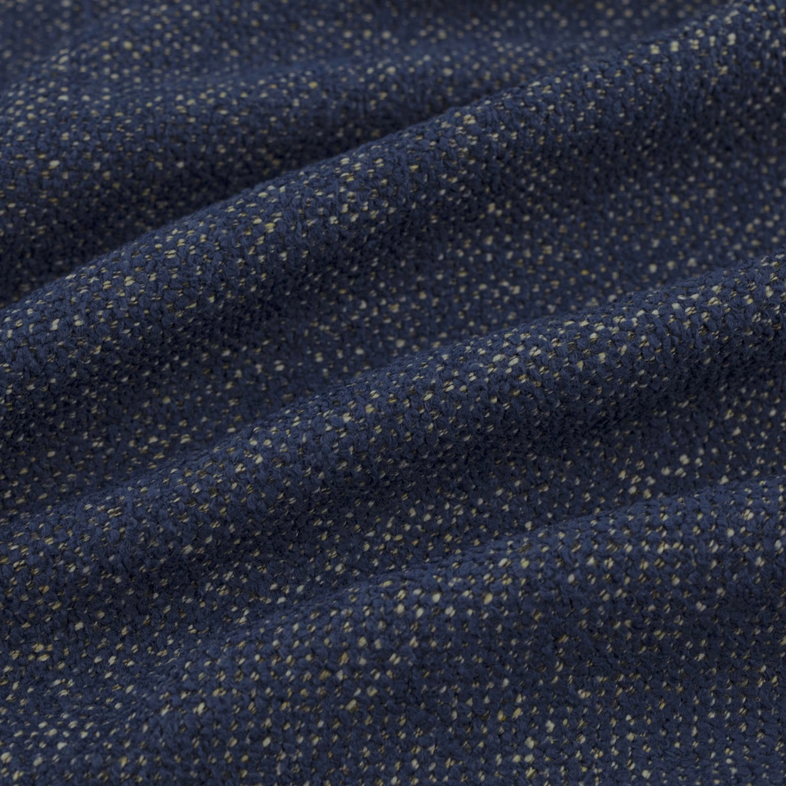 Deep indigo woven texture with muted olive flecks and folded ridges