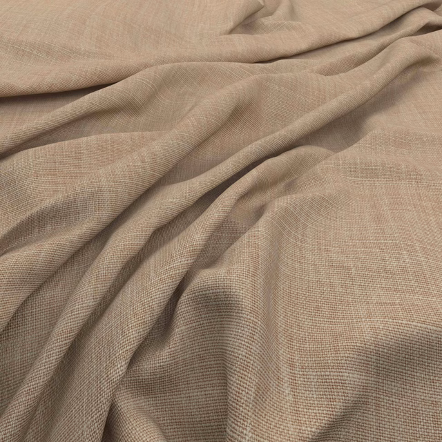 Muted blush-taupe fabric with a fine crosshatch weave arranged in soft folds
