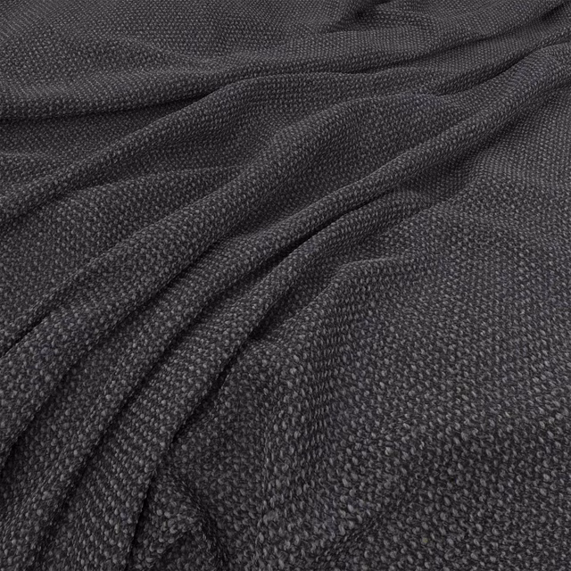 Dark pewter fabric with a small pebbled weave across softly folded cloth