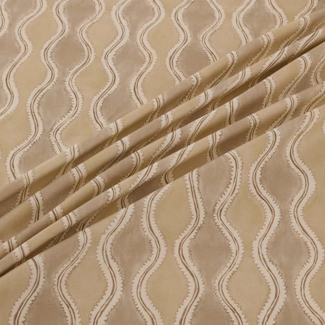 Warm beige Wading fabric with vertical undulating outlined motifs and softly textured surface