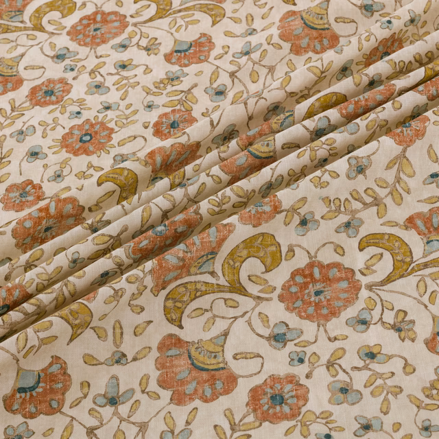 Cream floral fabric with coral blossoms, mustard scrolls and blue-green leaves