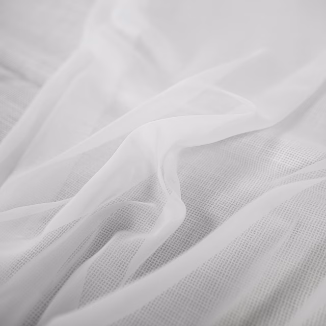 Soft white sheer mesh with translucent folds and a fine grid weave